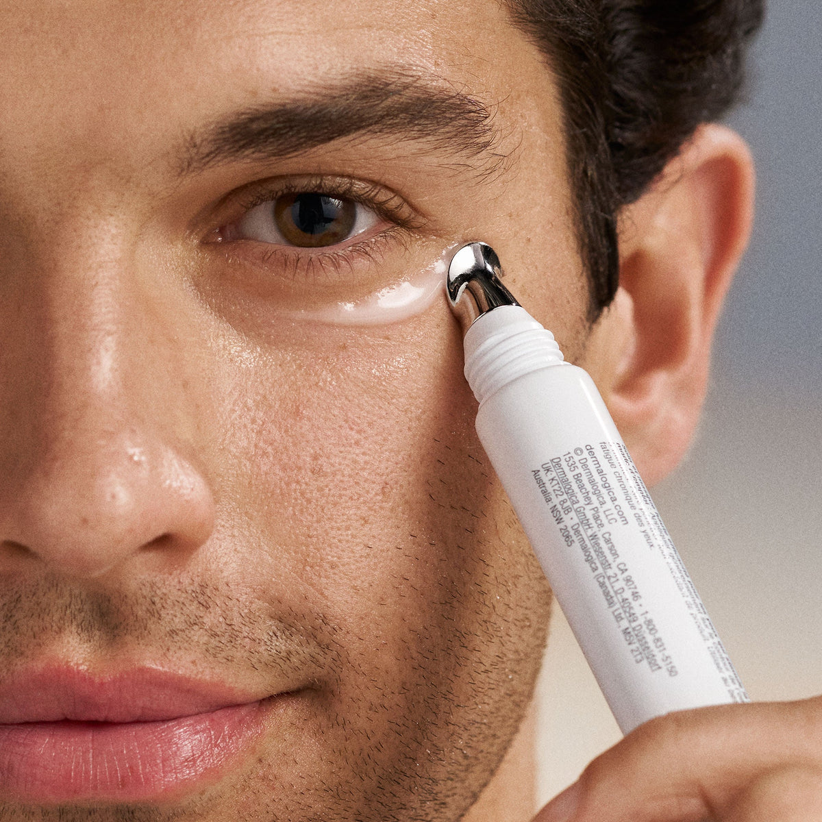 model applying stress positive eye lift mask 