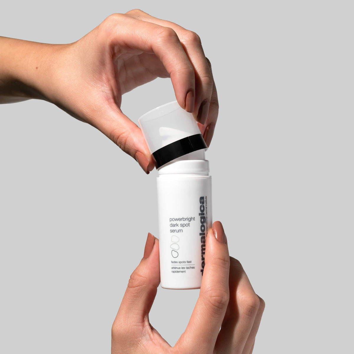 hand uncapping powerbright dark spot serum 